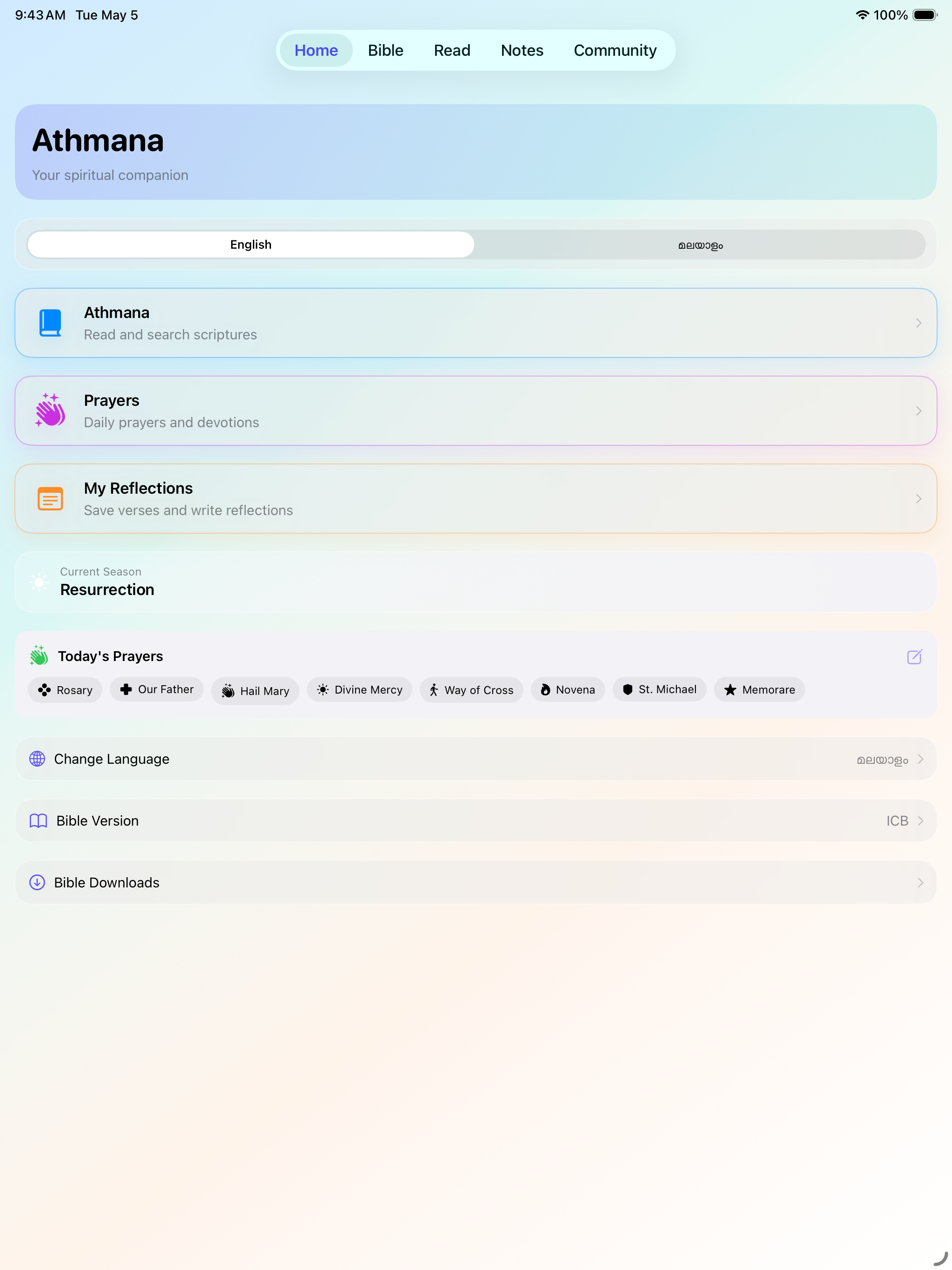 Athmana home screen on iPad with Home, Bible, Read, Notes, Community top tab bar and Bible Version and Downloads options